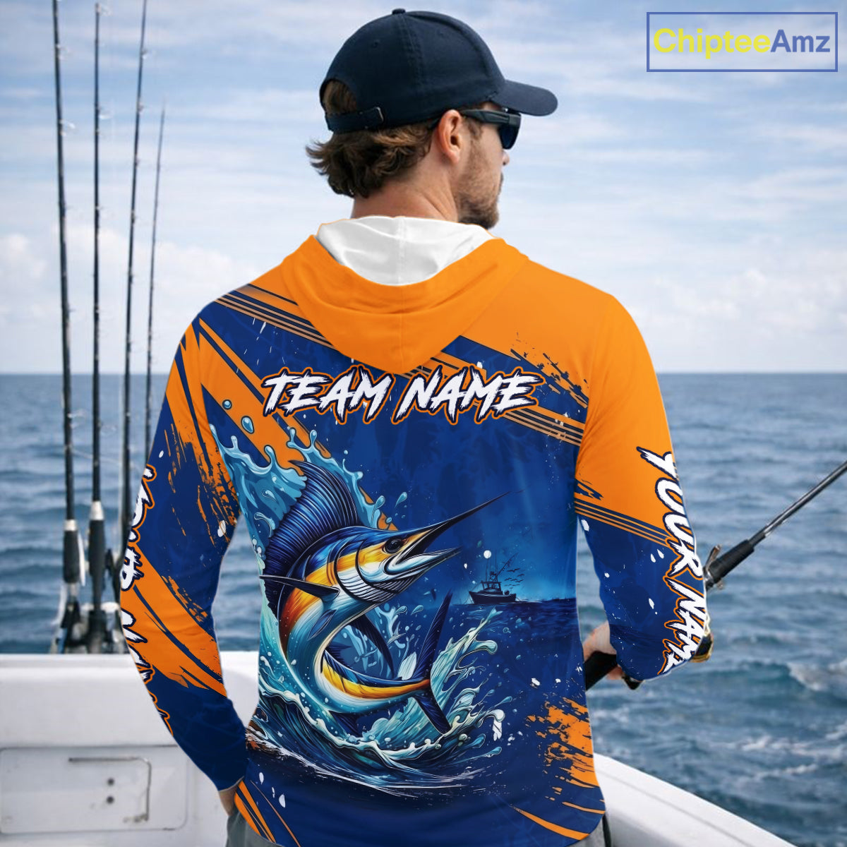 Angler wearing Custom Marlin Fishing Blue Orange long sleeve hooded saltwater fishing jersey 