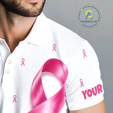 Load image into Gallery viewer, Close-up breathable fabric of white, pink breast cancer awareness ribbon pattern golf polo shirt with “Your Name" on the sleeve.