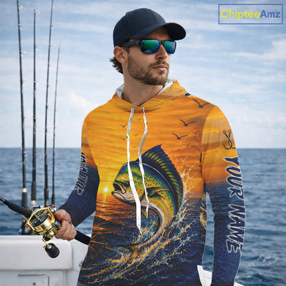 Angler wearing Mahi Mahi fishing sunset custom long sleeve hooded shirt on an offshore fishing trip