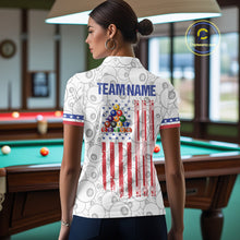 Load image into Gallery viewer, Back view of woman wearing a white patriotic 8 ball pool shirt in a billiards hall.