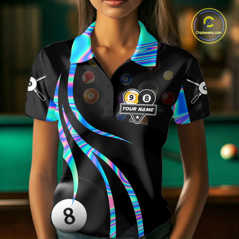 Woman wearing a holographic 8 ball and 9 ball billiard jersey beside a pool table front view.