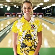 Load image into Gallery viewer, Woman wearing a funny yellow banana bowling polo shirt at a bowling alley front view.