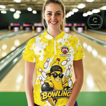 Load image into Gallery viewer, Woman wearing a funny yellow banana bowling quarter zip jersey during league competition front view.