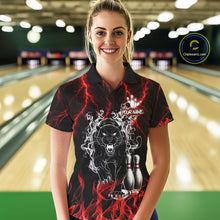 Load image into Gallery viewer, Woman wearing a red flaming panther bowling polo shirt at a bowling alley front view.