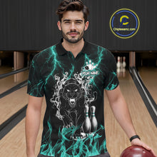 Load image into Gallery viewer, Man wearing a turquoise flaming panther bowling polo shirt at a bowling alley front view.