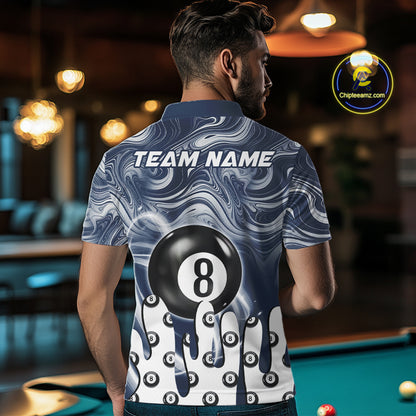 Back view of man wearing a blue marble swirl 8 ball pool shirt in a billiards hall.