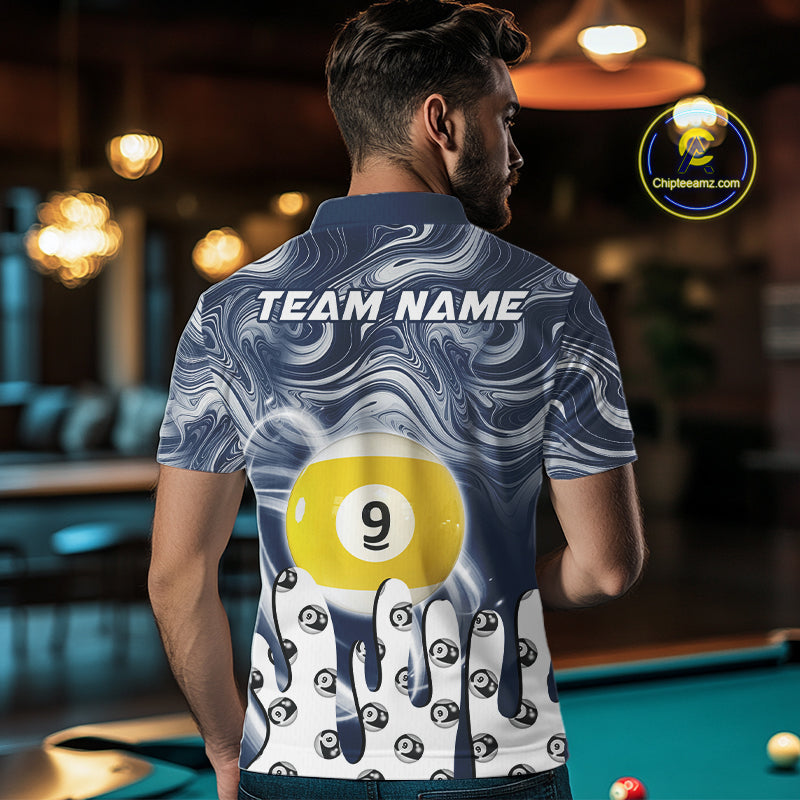 Back view of man wearing a blue marble swirl 8 ball and 9 ball pool shirt in a billiards hall.