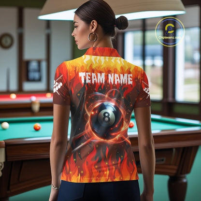 Back view of woman wearing a red 8 ball fire flame pool shirt in a billiards hall.