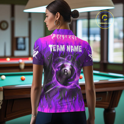 Back view of woman wearing a purple 8 ball fire flame pool shirt in a billiards hall.