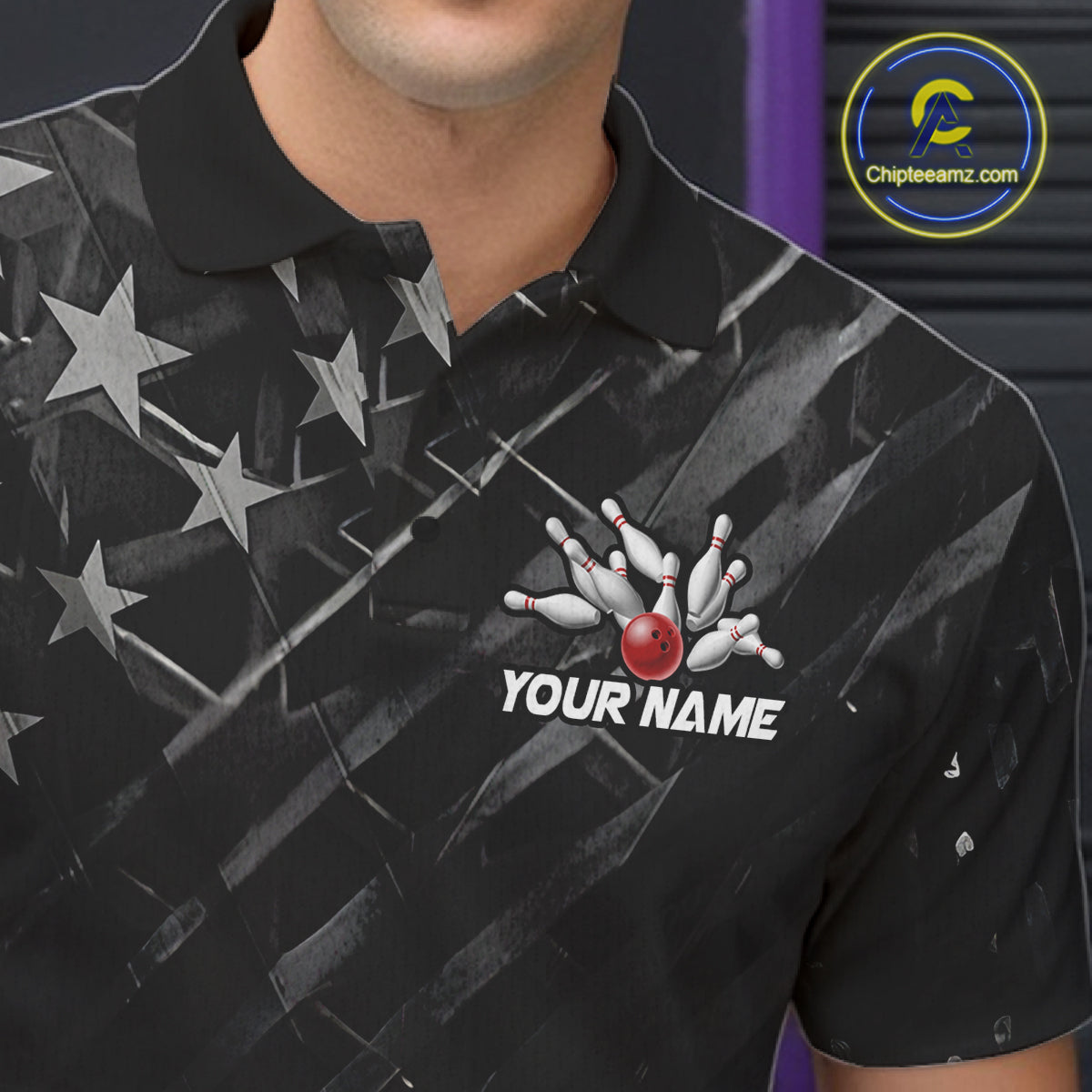 Close-up of black American flag bowling team jersey polo shirt featuring collar, buttons and patriotic American flag artwork.