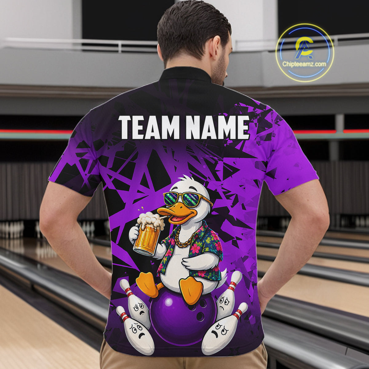 Man wearing personalized purple funny duck beer bowling team jersey quarter zip shirt featuring funny duck beer artwork, back view.