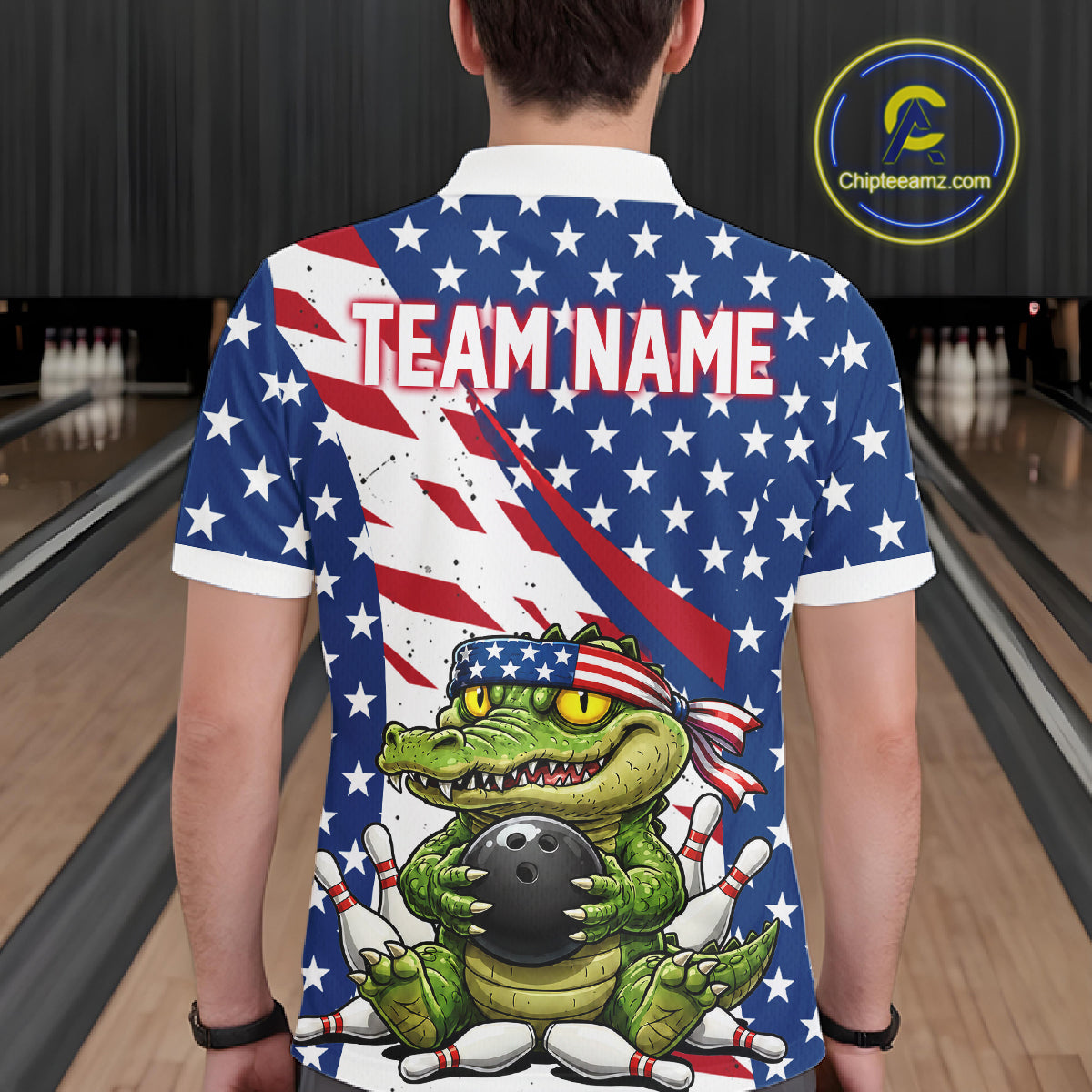 Person wearing a bowling shirt with American flag design and cartoon character on a bowling alley.