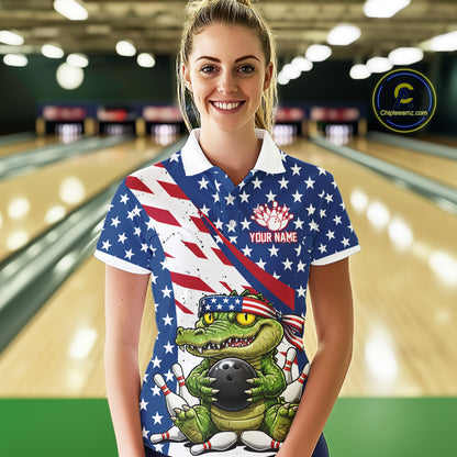 Women wearing a patriotic polo shirt with an alligator  graphic in a bowling alley.