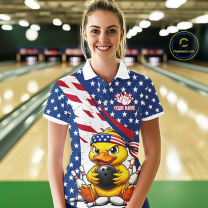 Women wearing a patriotic polo shirt with a duck graphic in a bowling alley.