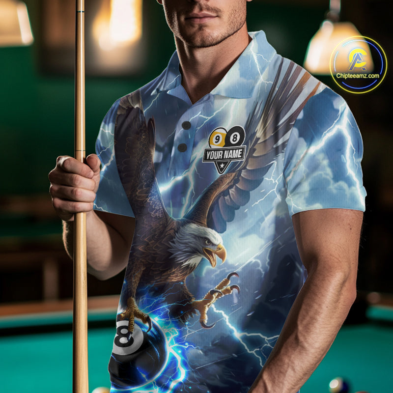 Man wearing a blue lightning eagle billiard jersey beside a pool table front view.