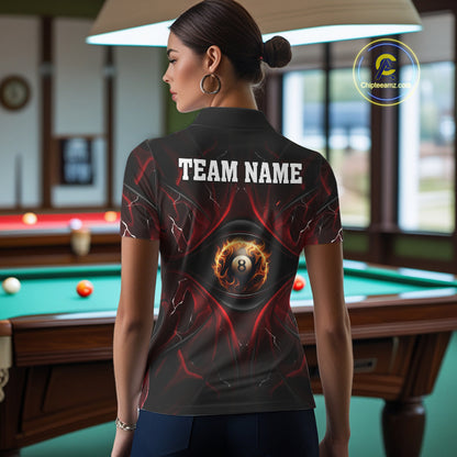 Back view of woman wearing a black and red flame pool team shirt in a billiards hall.