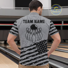 Load image into Gallery viewer, Back view of man wearing a grey American flag bowling quarter zip shirt at a bowling alley.