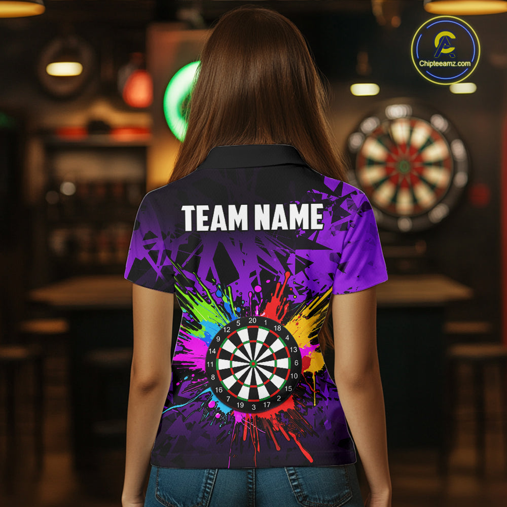 Back view of woman wearing a colorful purple darts jersey inside a darts hall.