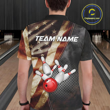 Load image into Gallery viewer, Back view of man wearing a retro American flag bowling polo shirt inside a bowling alley.