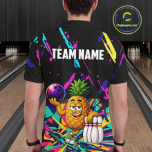 Load image into Gallery viewer, Back view of man wearing a colorful pineapple bowling polo shirt inside a bowling alley.