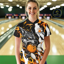 Load image into Gallery viewer, Woman wearing personalized orange flame wolf bowling team jersey polo shirt featuring orange flame wolf artwork, back view.