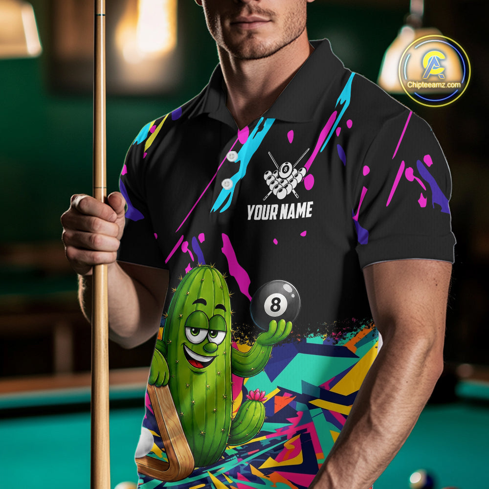 Man wearing a colorful cactus 8 ball billiard jersey beside a pool table front view.