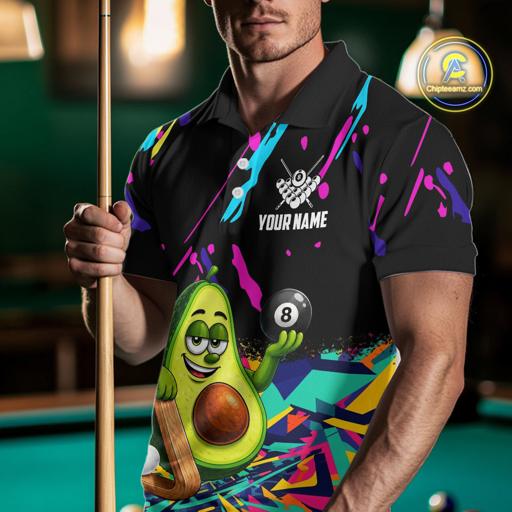 Man wearing a colorful avocado 8 ball billiard jersey beside a pool table front view.