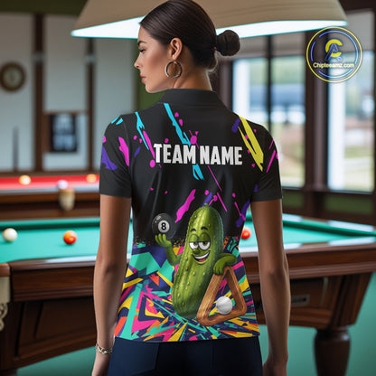 Back view of woman wearing a colorful pickle 8 ball pool shirt in a billiards hall.