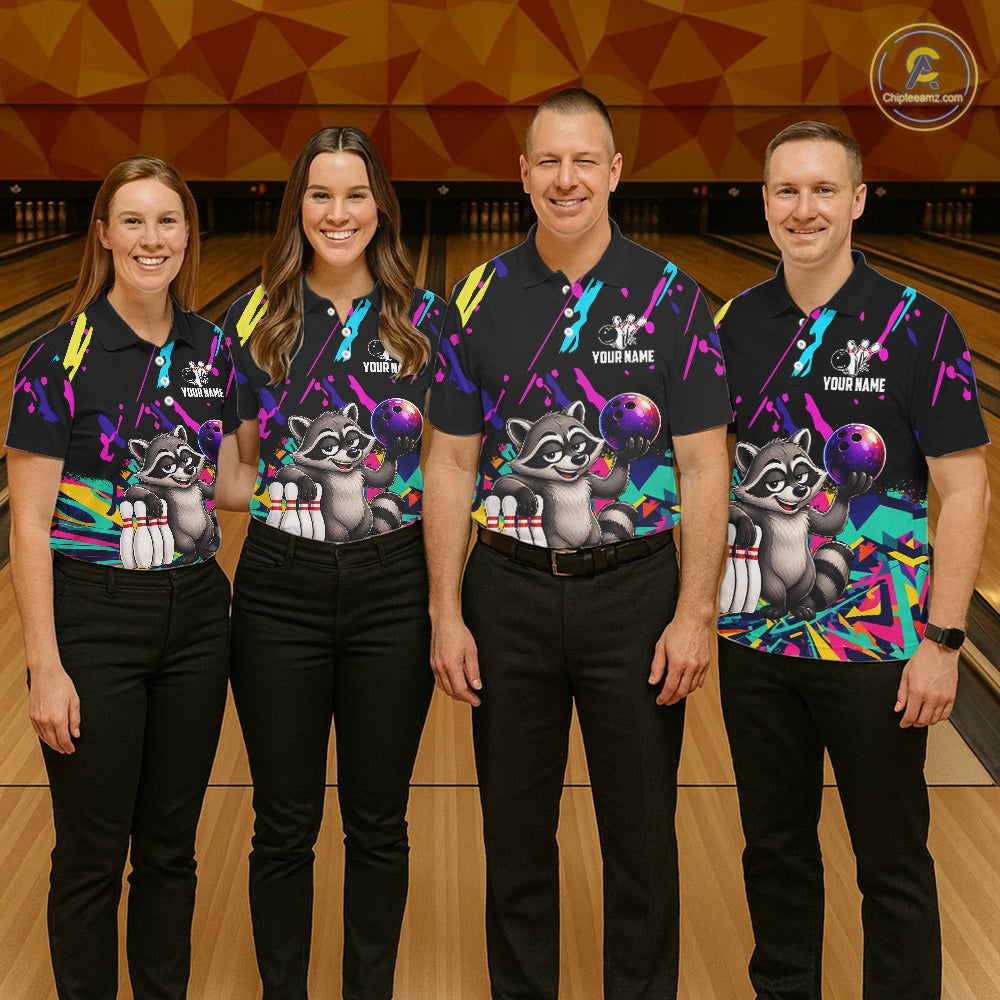 Four people wearing matching bowling-themed shirts with raccoon graphic in a bowling alley.