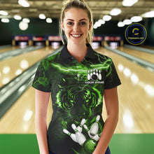 Load image into Gallery viewer, Woman wearing green thunder lightning tiger bowling polo shirt front view.