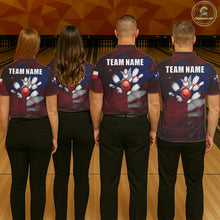 Load image into Gallery viewer, Back view of bowling team wearing matching Texas bowling shirts in a bowling alley.