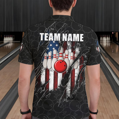 Back view of man wearing a vintage American flag black bowling polo shirt inside a bowling alley.