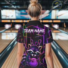 Load image into Gallery viewer, Back view of woman wearing a funny purple neon raccoon bowling polo shirt inside a bowling alley.