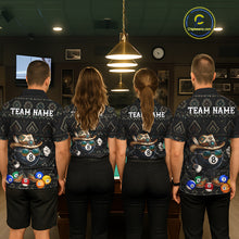 Load image into Gallery viewer, Back view of pool players wearing matching tribal 8 ball billiard shirts in a game room.