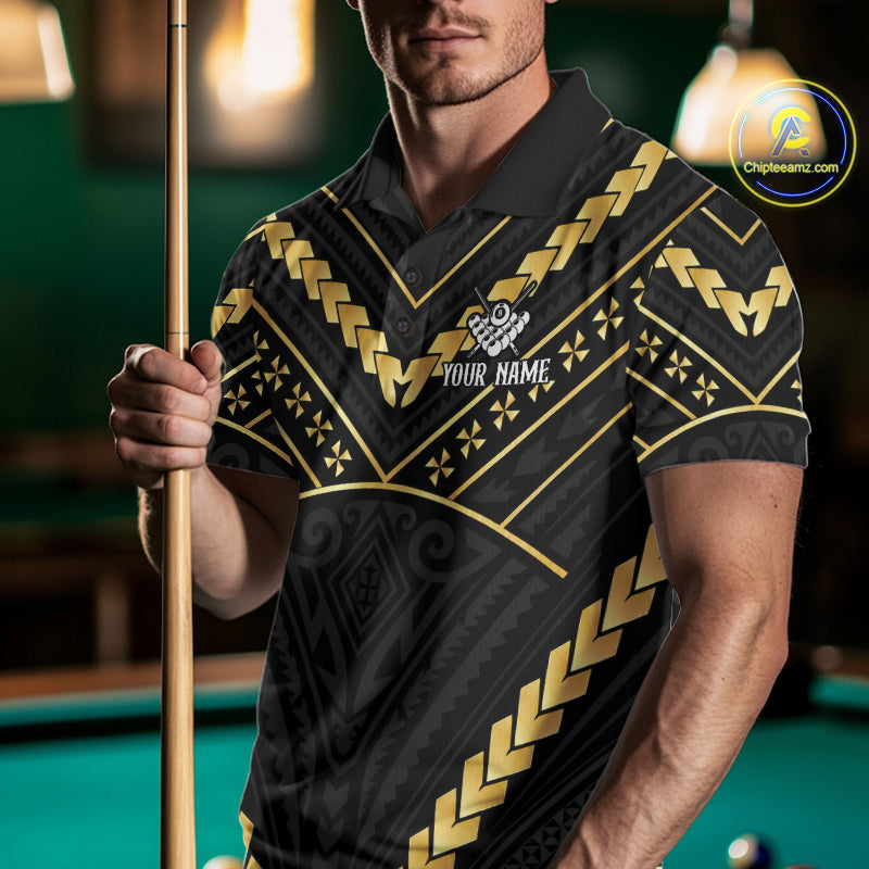Man wearing a black and gold 8 ball tribal billiard jersey beside a pool table front view.