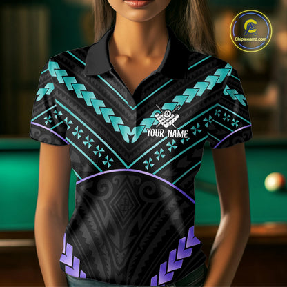 Back view of woman wearing a teal and purple 8 ball tribal pool shirt in a billiards hall.