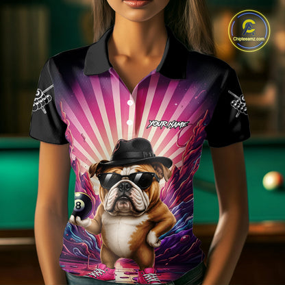 Woman wearing a pink graffiti bulldog 8 ball billiard jersey beside a pool table front view.
