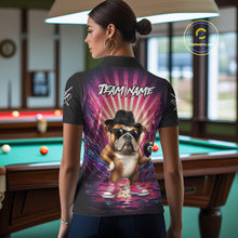 Load image into Gallery viewer, Back view of woman wearing a pink graffiti bulldog 8 ball pool shirt in a billiards hall.