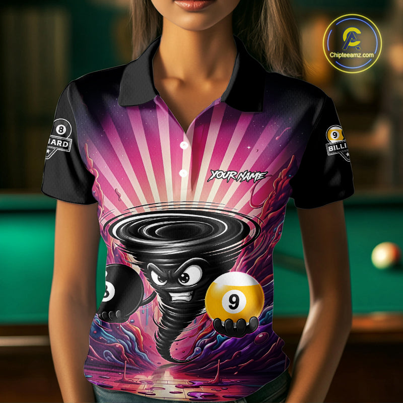 Woman wearing a pink graffiti tornado 8 ball and 9 ball billiard jersey beside a pool table front view.