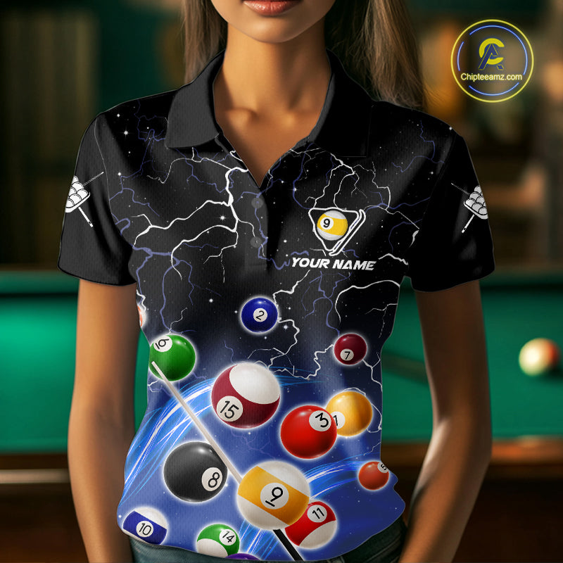 Woman wearing a blue grim reaper lightning 9 ball billiard jersey beside a pool table front view.