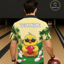 Load image into Gallery viewer, Person wearing a shirt with a cartoon duck holding a bowling ball and text 'TEAM NAME' in a bowling alley.
