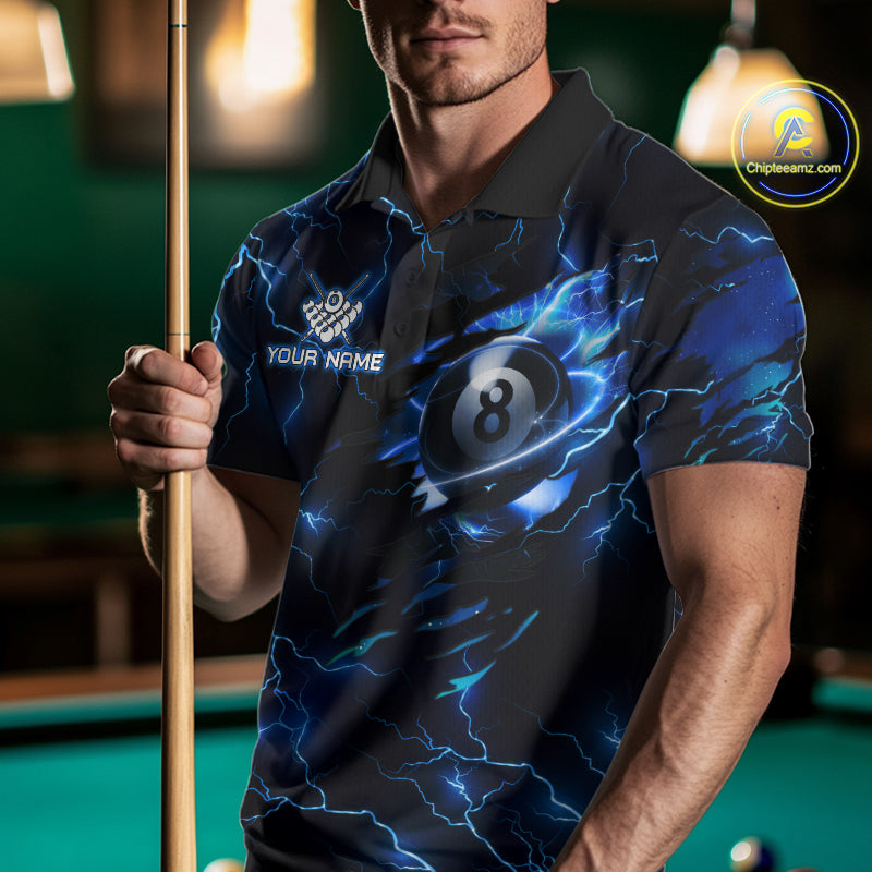 Man wearing a blue thunder lightning billiard jersey beside a pool table front view.