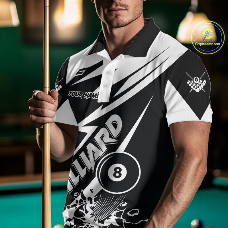 Man wearing a funny black and white 8 ball billiard jersey beside a pool table front view.