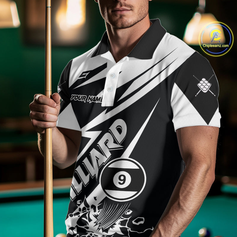 Man wearing a funny black and white 9 ball billiard jersey beside a pool table front view.
