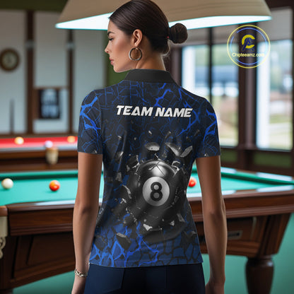 Back view of woman wearing a blue crack pool shirt in a billiards hall.