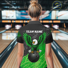 Load image into Gallery viewer, Woman wearing personalized black and green eagle bowling team jersey quarter zip shirt featuring black and green eagle artwork, front view.