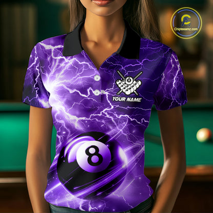 Woman wearing a purple 8 ball thunder lightning billiard jersey beside a pool table front view.