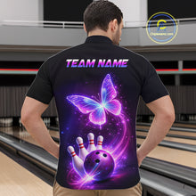 Load image into Gallery viewer, Person wearing a black shirt with a colorful design of a butterfly, bowling ball, and pins on the back, with 'TEAM NAME' text.