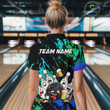 Load image into Gallery viewer, Woman wearing blue and turquoise drunk bowling balls bowling polo shirt back view.