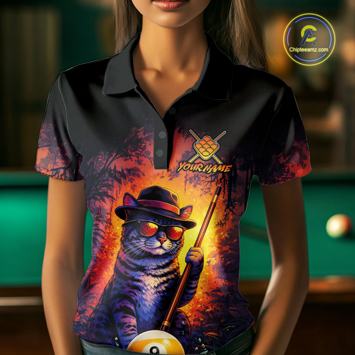Woman wearing a vintage funny cat 9 ball billiard jersey beside a pool table front view.